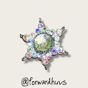 Vintage Sparkling Rhinestone Starburst Pin – Iridescent Center Stone